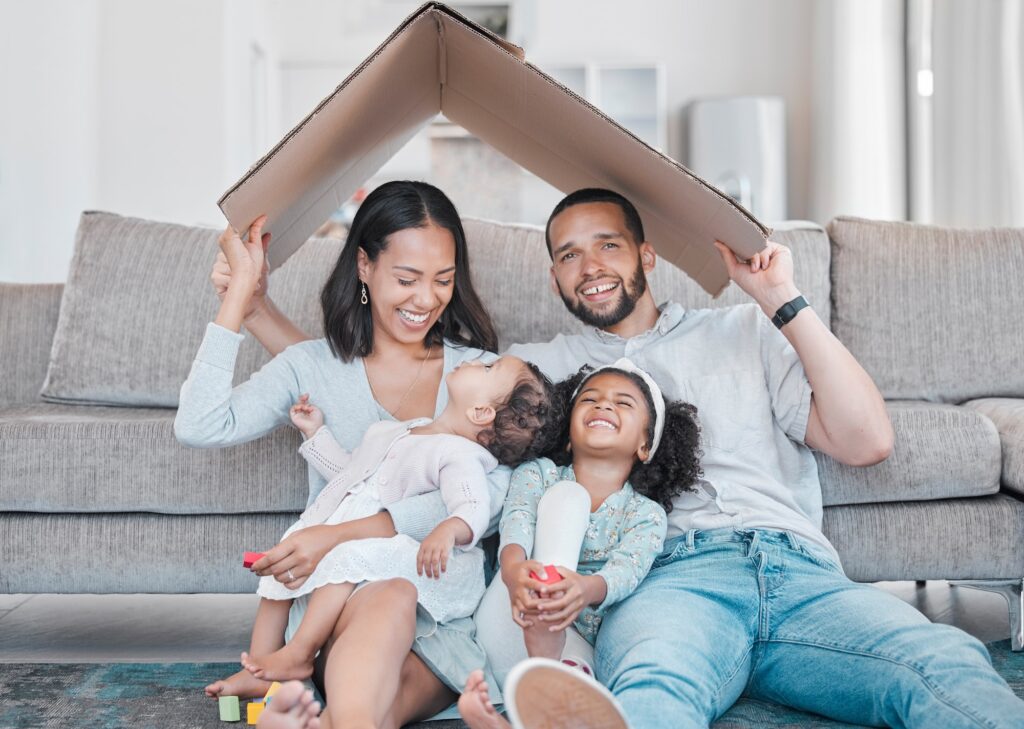 Family, children and insurance with a mother, father and daughter siblings in a living room of thei